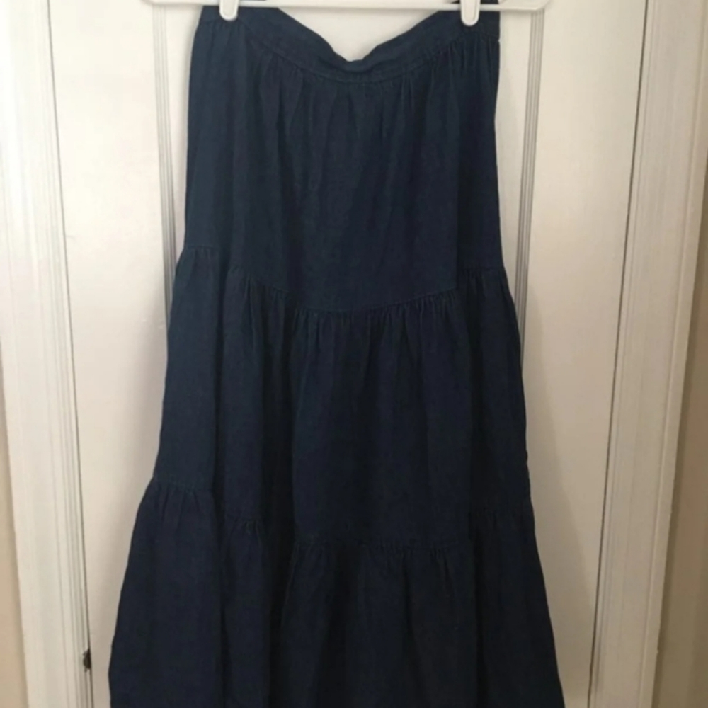 Long flowing blue denim material like skirt